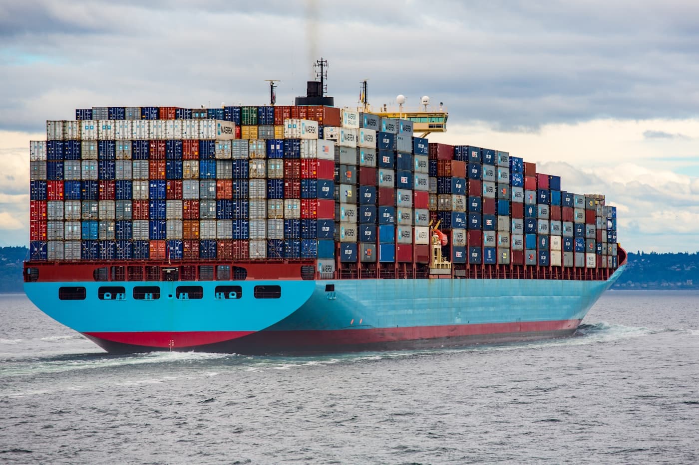 Shipping containers at a cargo port representing global logistics